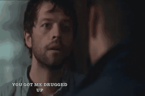 a man with a beard is talking to another man with the words `` you got me drugged up '' written below him .