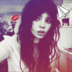 a pixelated image of a woman with a paper airplane and a kiss on her lips