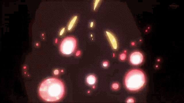 a close up of a red glowing object in the dark