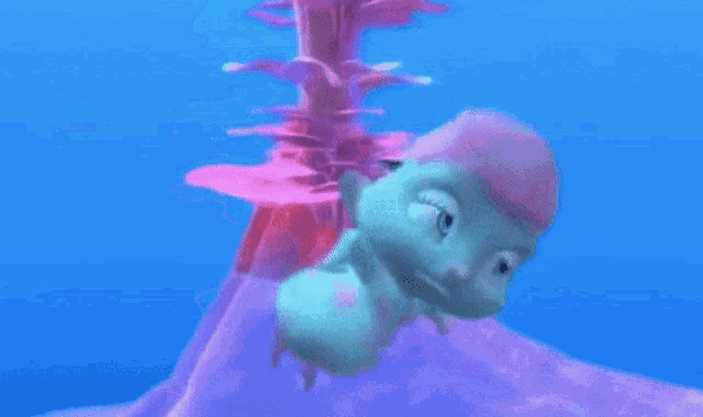 a cartoon character is swimming in the ocean next to a pink volcano .