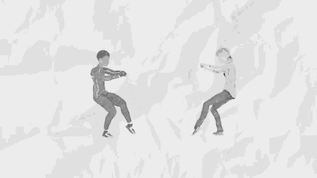 a couple of people are dancing on a piece of crumpled paper .