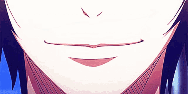 a close up of a person 's mouth with a smirk on it