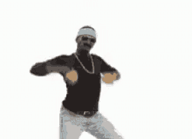 a man wearing sunglasses and a headband is dancing in front of a white background .