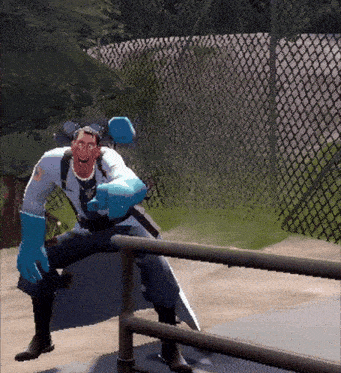 a man wearing blue gloves and a white shirt is standing on a railing