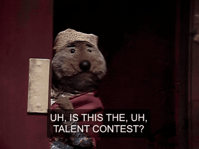 two stuffed animals are standing next to each other and one says uh is this the talent contest