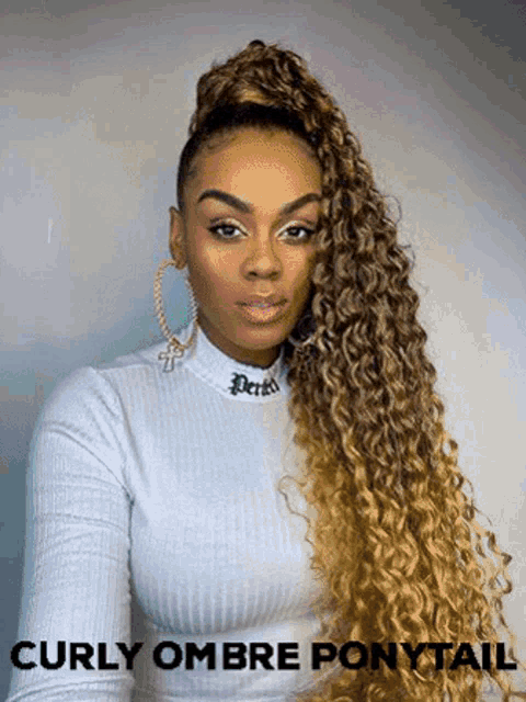 a woman with curly hair is wearing a ponytail