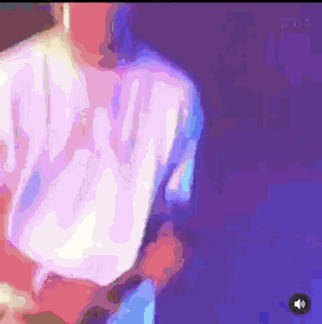 a blurry image of a person with a purple background