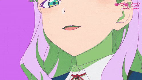 a close up of a girl 's face with the word love live on the bottom left