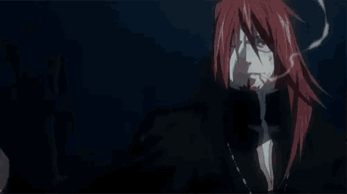 a man with red hair is tied up with a gun