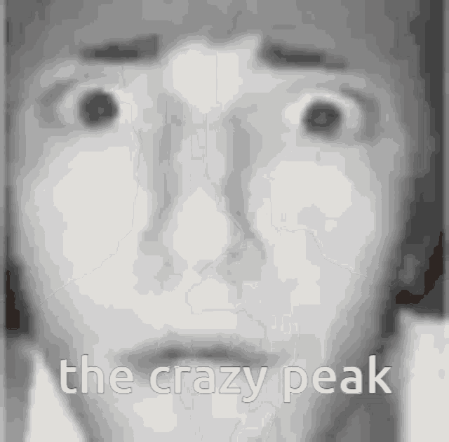 a black and white photo of a person 's face with the words the crazy peak written above it .