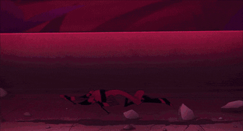 a cartoon character with big red eyes is holding a tv screen