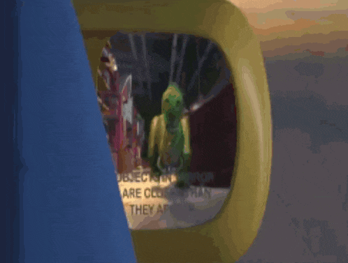 a toy story character is seen in the rear view mirror of a car