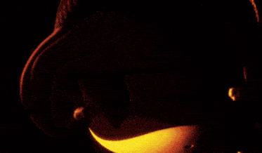 a close up of a person 's face with purple eyes
