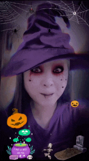 a woman in a witch costume has a purple hat on her head