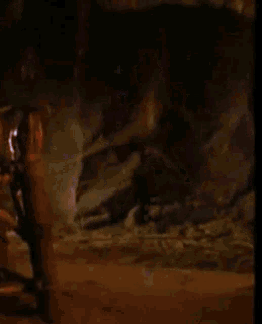 a blurred image of a light coming out of a hole in the ground
