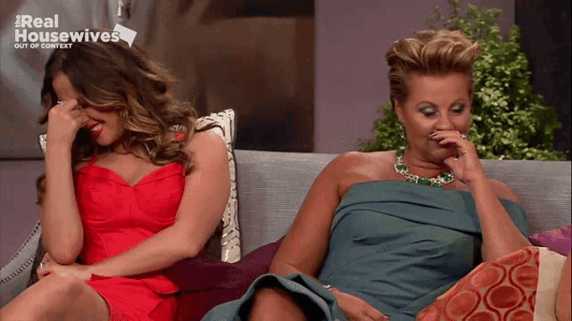 two women sitting on a couch with the words real housewives out of context on the bottom