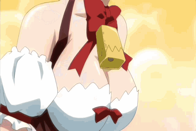a woman 's breasts are shown with a bell hanging from her neck