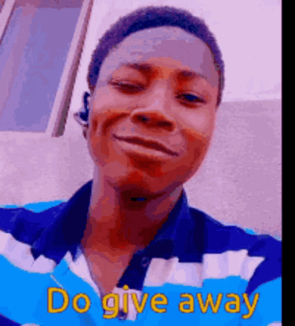 a man wearing a blue and white striped shirt is smiling and says do give away