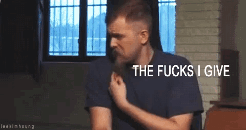 a man with a beard says the fucks i give in a room