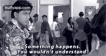 a man is standing in front of a crowd of people and saying `` something happens , you wouldn 't understand . ''