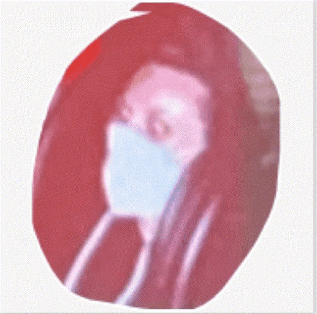 a close up of a person wearing a mask on their face