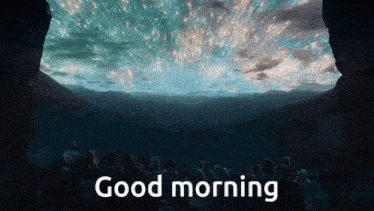 a group of people watching fireworks with the words " good morning " above them