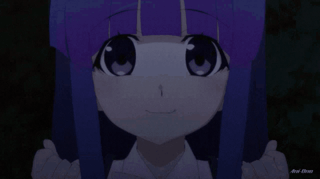 a close up of a girl with purple hair and an anime logo in the bottom right corner