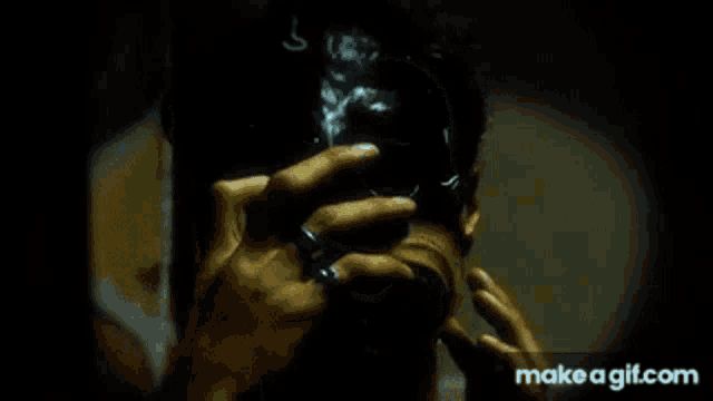 a close up of a person 's face with a mask on .