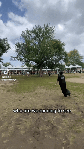 a person running in a field with the words " who are we running to see " on the bottom