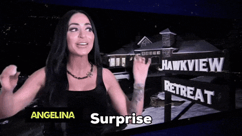 a woman is standing in front of a sign that says surprise