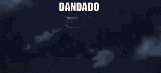 a close up of a person 's face with the words dandado written on it .
