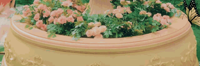 a close up of a woman holding a pink rose in her hand .