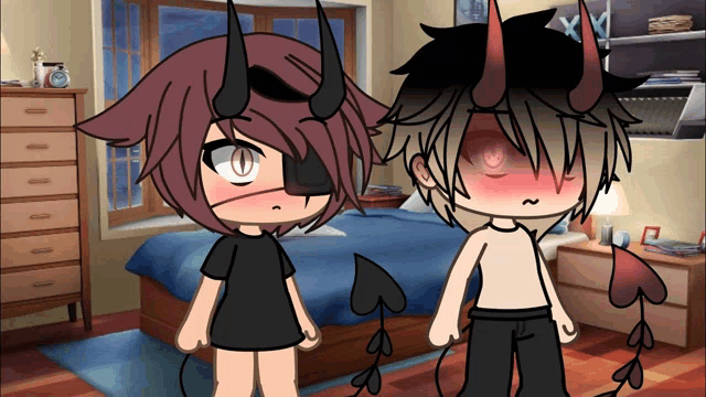 a couple of cartoon characters with horns standing next to each other