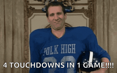 a man in a polk high football jersey holds a football