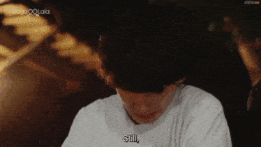 a close up of a person 's face with a phrase that says `` still '' .