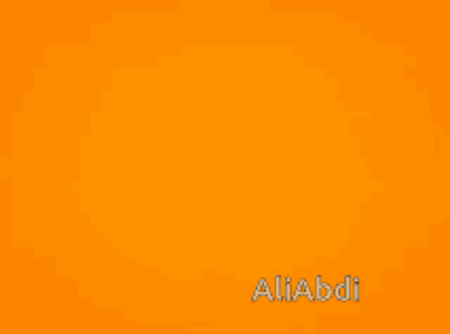 a yellow truck with the word aliabdi written on the bottom