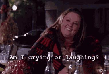 a woman is laughing and crying with the words " am i crying or laughing ? laughing oh good "