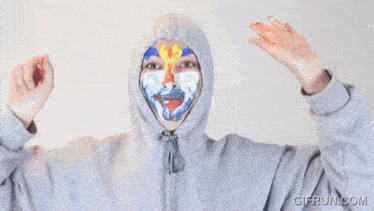 a woman with paint on her face has a gifrun.com watermark on the bottom right