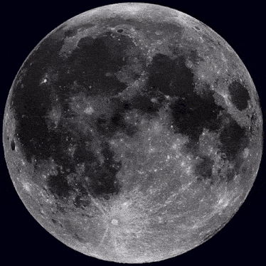 a full moon against a dark sky