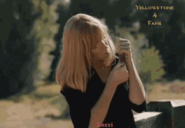 a woman with blonde hair is standing next to a fence with the words yellowstone 4 fans on the bottom