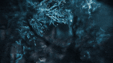 a dark blue background with a lot of sparkles on it
