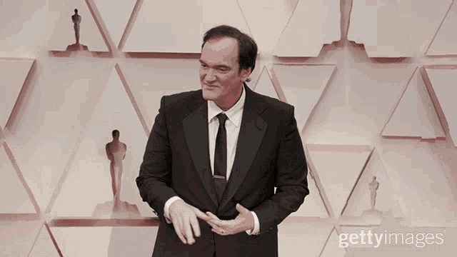 Quentin Tarantino Peace Out GIF - Quentin Tarantino Peace Out Peace Sign GIFs