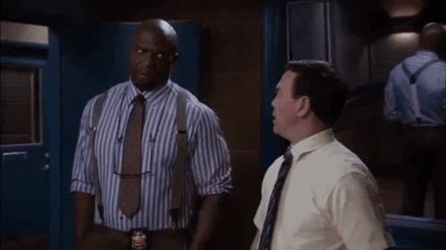 a man in a striped shirt and tie says cuz