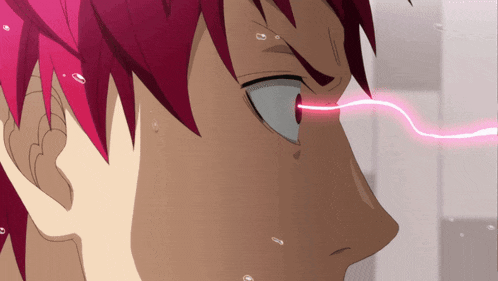 a close up of a person 's face with a red hair