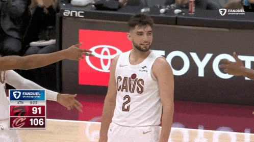 a basketball player with the number 2 on his shirt