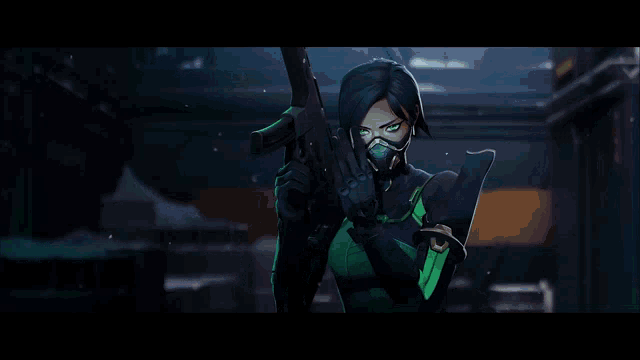 a woman in a mask is holding a gun