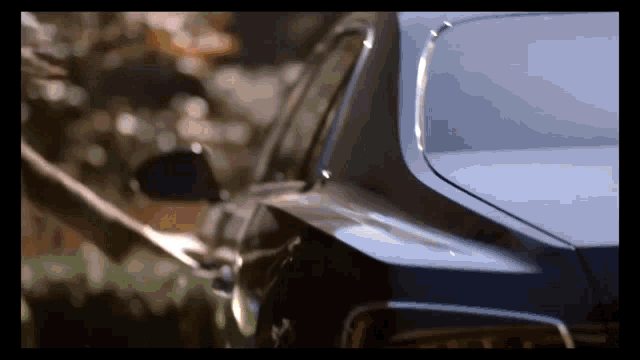 a close up of a car 's trunk with the word tesla on it