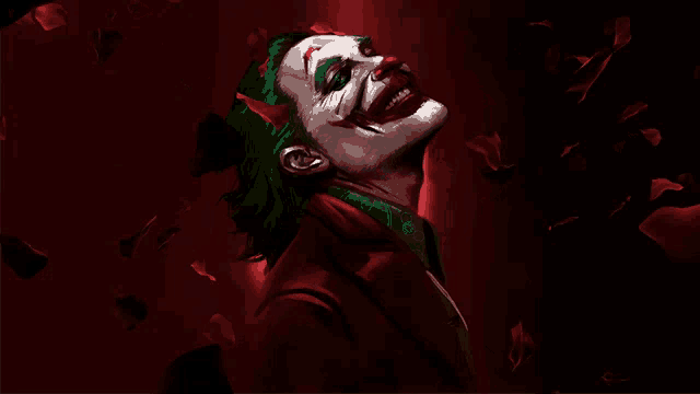 the joker is surrounded by rose petals and looks up at the sky