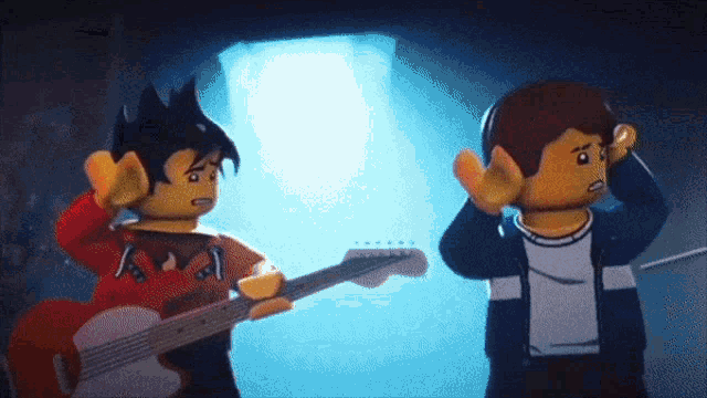 a lego man playing a guitar next to another man covering his ears