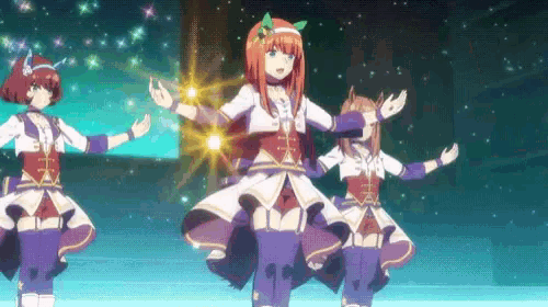 a group of anime girls are dancing on a stage with their arms outstretched .